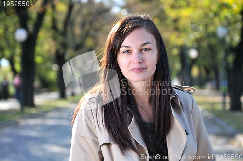 Image of Cute young woman smiling 