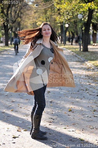Image of Cute young woman smiling
