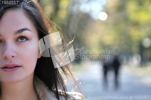 Image of Cute young woman smiling 