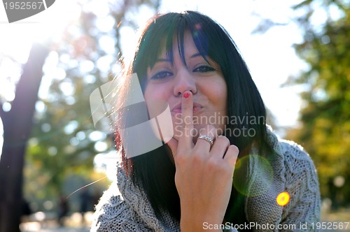 Image of brunette Cute young woman  posing outdoors