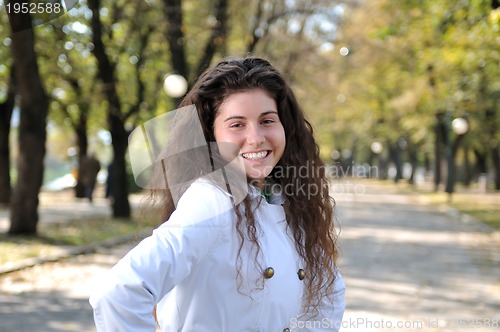 Image of Happy young woman smiling 