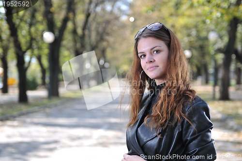 Image of Happy young woman smiling 