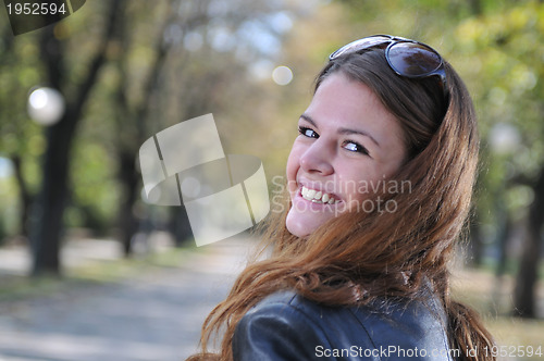 Image of Happy young woman smiling 