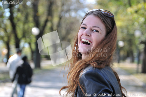Image of Happy young woman smiling 