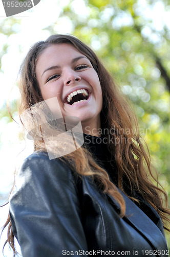 Image of Happy young woman smiling 