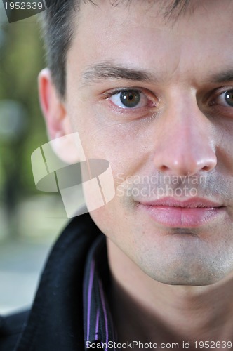 Image of Handsome young man looking