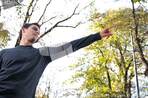 Image of Handsome young man expressing his inner feelings