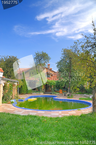 Image of luxury house with swimming pool