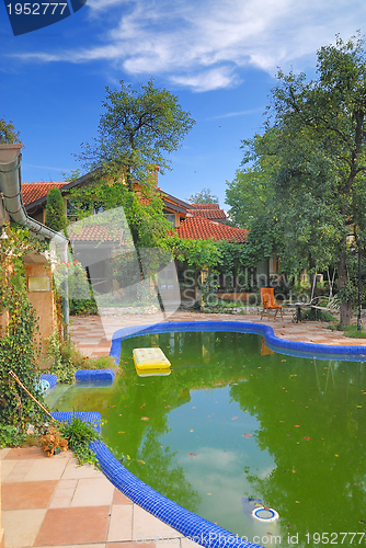 Image of luxury house with swimming pool