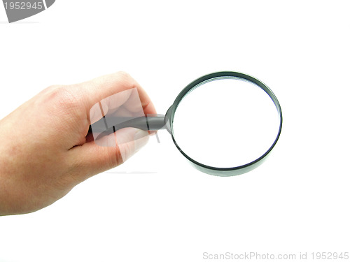 Image of hand with magnifying glass