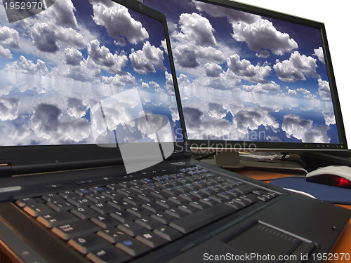 Image of dramatic blue sky on dual display