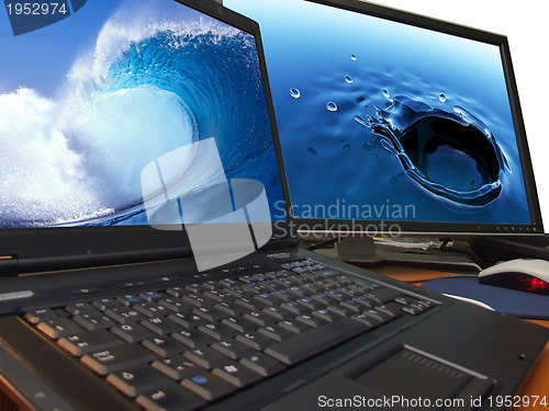 Image of water concept on laptop and big widescreen tft display