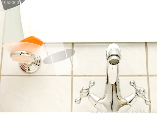 Image of retro tap and orange soap