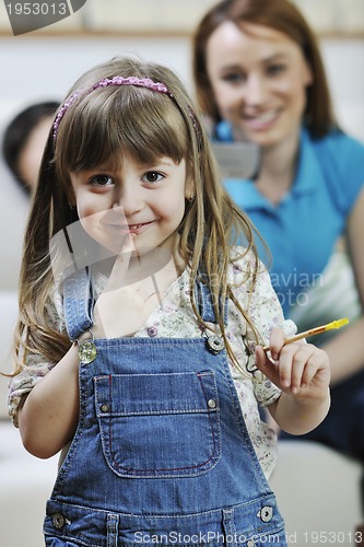 Image of happy young family at home