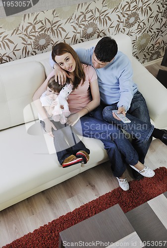 Image of happy young family at home