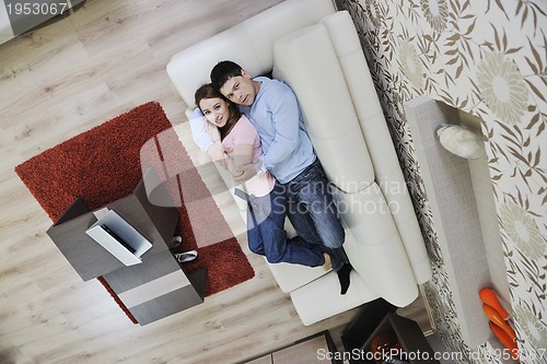Image of couple relax at home on sofacouple relaxing at home