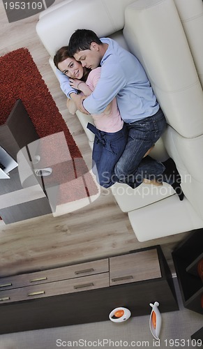 Image of couple relaxing at home