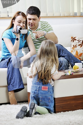 Image of happy family special moments on video