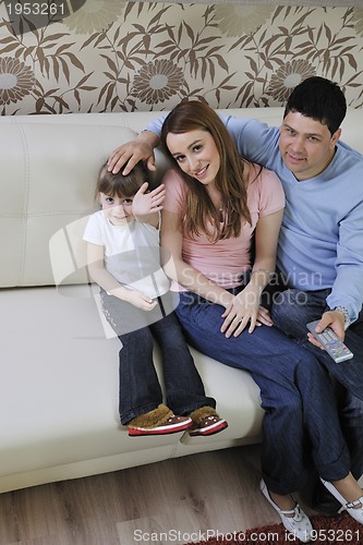 Image of happy young family at home