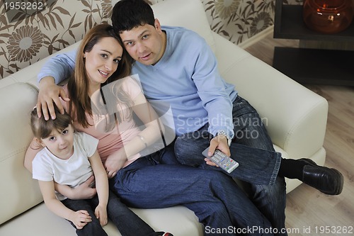 Image of happy young family at home