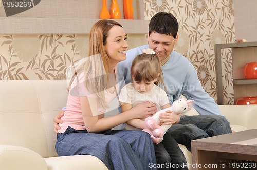 Image of happy young family at home