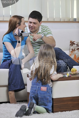 Image of happy family special moments on video