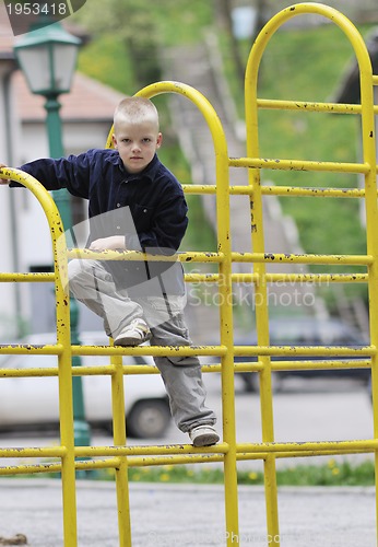 Image of blonde boy in park