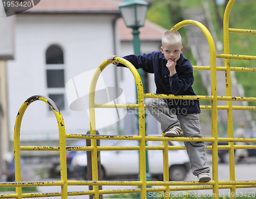 Image of blonde boy in park