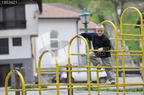 Image of blonde boy in park