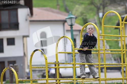 Image of blonde boy in park