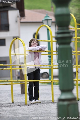 Image of happy young girl in park 