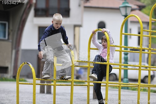 Image of happy brother and sister outdoor in park