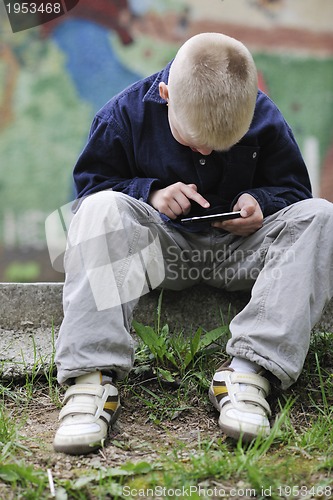 Image of playing video games outdoor