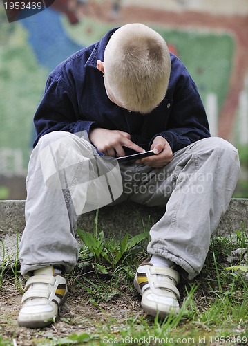 Image of playing video games outdoor