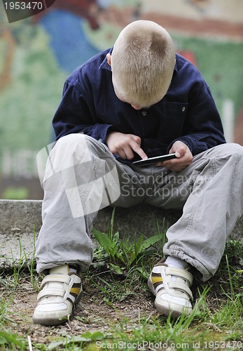 Image of playing video games outdoor