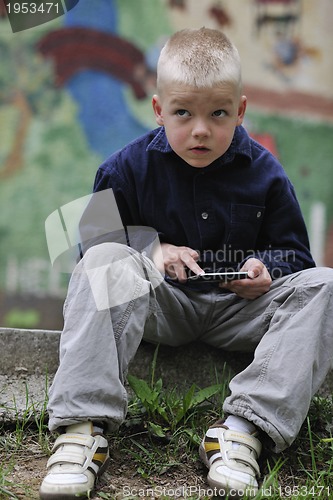 Image of playing video games outdoor