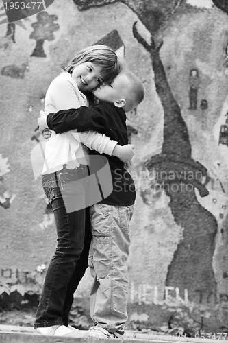 Image of happy brother and sister outdoor in park