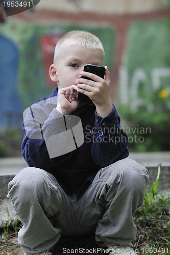 Image of playing video games outdoor