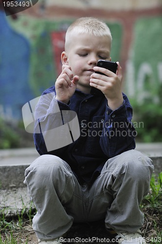 Image of playing video games outdoor