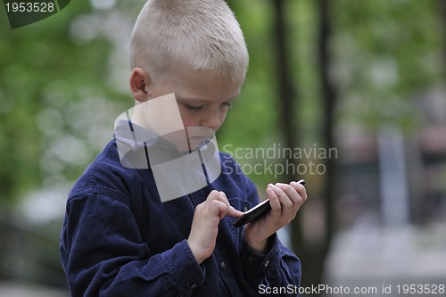 Image of playing video games outdoor