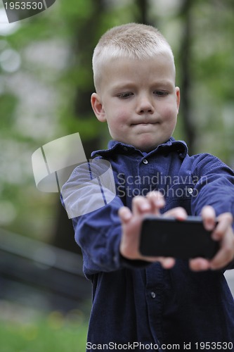 Image of playing video games outdoor