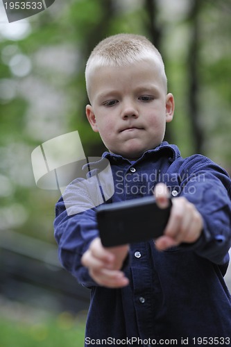 Image of playing video games outdoor