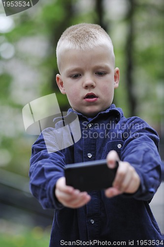 Image of playing video games outdoor