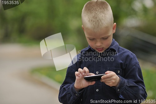 Image of playing video games outdoor