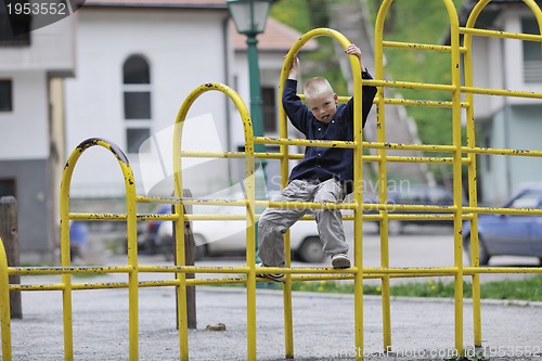 Image of blonde boy in park