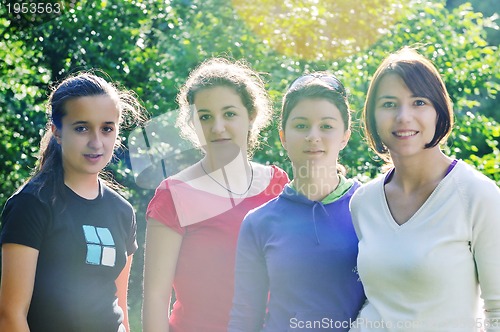 Image of teen girls group outdoor