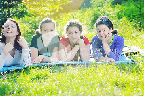 Image of teen girls group outdoor