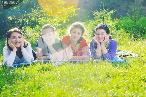 Image of teen girls group outdoor