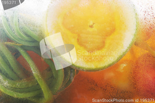 Image of Fruits and vegetables frozen in ice