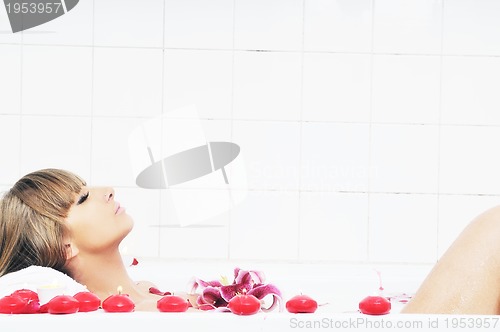 Image of woman bath flower